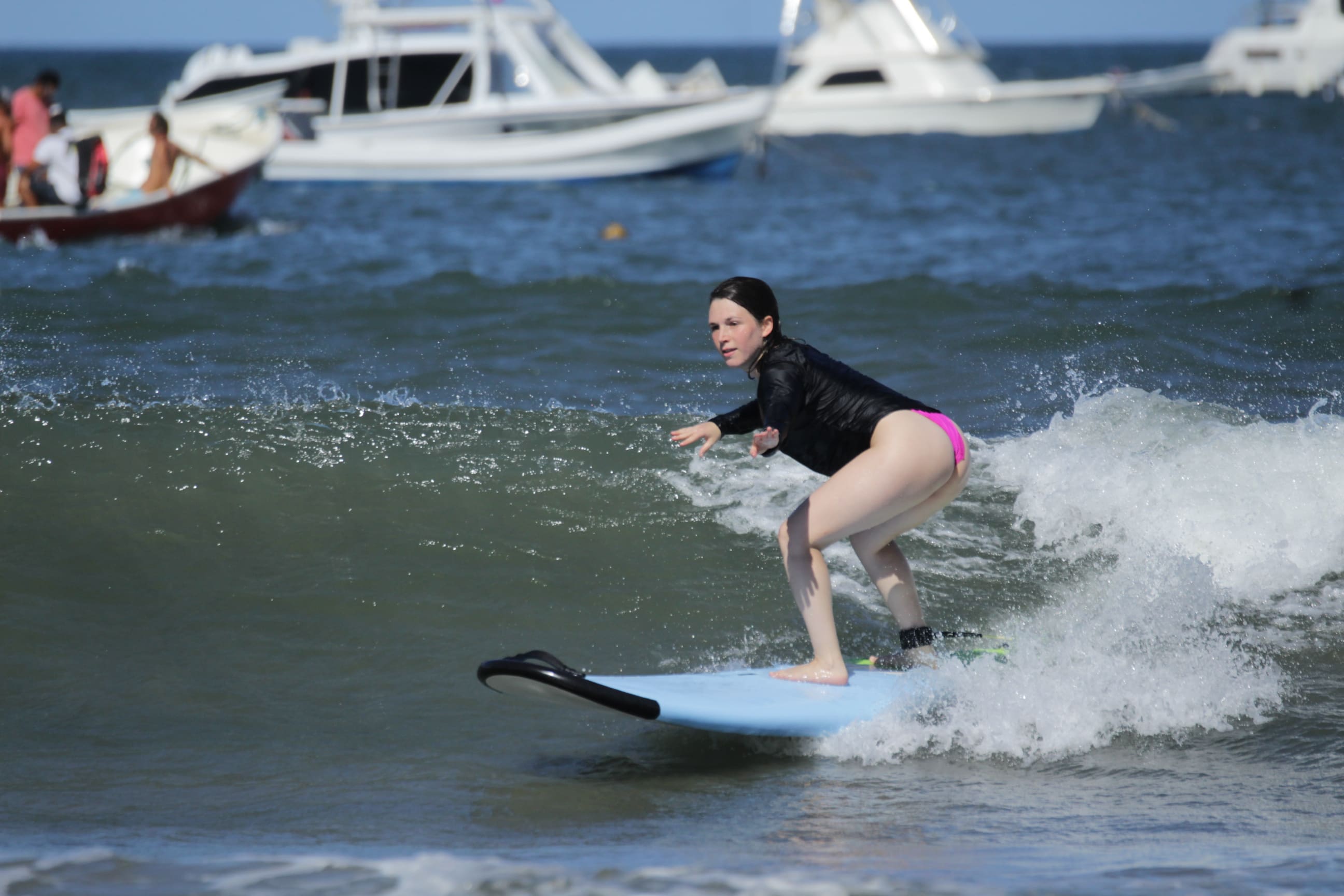 A surf lesson taking place on Tamarindo beach